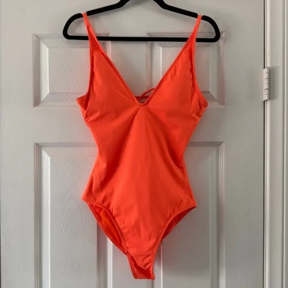 ta3 hi cut plungey one piece swim in orange, women size medium regular / long